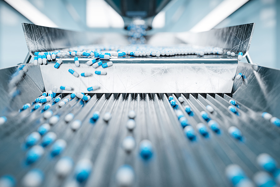 Sorting pharmaceutical capsules by a sorting machine on a production line